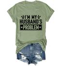Camisa Cibwobi Im My Husbands Problem Funny Wife verde unissex Camisa Cibwobi Im My Husbands Problem Funny Wife verde unissex