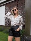 Camisa floral onça