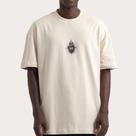 Camiseta MCD Box Fit Sagrado Coração SM26 Masculina Bege Camiseta MCD Box Fit Sagrado Coração SM26 Masculina Bege