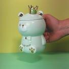 Caneca de Porcelana 3D com Tampa e Colher - Ursinho Verde Fofinho Caneca de Porcelana 3D com Tampa e Colher - Ursinho Verde Fofinho