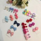 Cartela de laços para bebê pompom