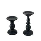 Castiçais elegantes de metal preto para jantares e decoração