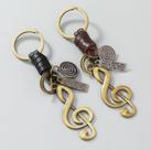 Chaveiro Clave de Sol estilo Vintage Metal e Couro + 4 pingentes Chaveiro Clave de Sol estilo Vintage Metal e Couro + 4 pingentes