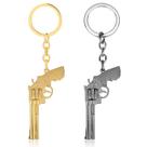 Chaveiro The Walking Dead Revolver Gun com acabamento dourado e prateado