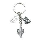 Chaveiro vintage prateado com pingente de cacto e chaveiro de metal Chaveiro vintage prateado com pingente de cacto e chaveiro de metal