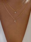 Choker lua e ponto de luz dourado