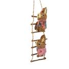 Coelhos páscoa em palha na escada