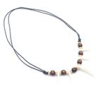 Colar Caiyao Tribal com Dente de Lobo Acrílico Ajustável