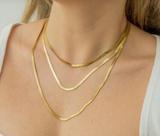 Colar fita fina tripla dourado aço 316l
