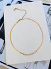 Colares choker folheado a ouro modelo fita com ponto de luz