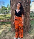 Conjunto ( cropped preto curto tamanho M calçça laranja tamanho M longa adulto feminino