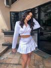 Conjunto de blusa e saia