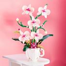 Conjunto de construção: xícara de café com flor de orquídea rosa iixeal, 567 unidades Conjunto de construção: xícara de café com flor de orquídea rosa iixeal, 567 unidades