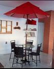 Conjunto de mesa e cadeira + ombrelone