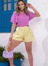 Conjunto de short curto amarelo e blusa cor de rosa