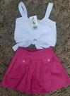 Conjunto de short saia com blusa de lesie com laço na frente tamanho 06