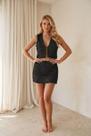 Conjunto em material sintético Saia e Colete com Franjas Cor:PretoTamanho:P