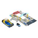 Conjunto Matchbox HMH29 - Porto de Balsa com Balsa de Rodas Removível Conjunto Matchbox HMH29 - Porto de Balsa com Balsa de Rodas Removível