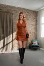 Conjunto material sintético Saia Curta e Colete Frente única Cor:CarameloTamanho:G