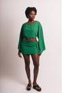 Conjunto Penelope - Saia Curta e Blusa de Mangas Amplas Conjunto Penelope - Saia Curta e Blusa de Mangas Amplas