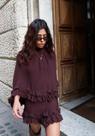 Conjunto Tricô Izzie - Blusa Poncho e Saia Curta em Tons Terrosos
