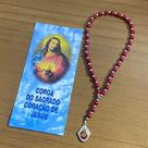 Coroa terço Sagrado Coração de Jesus vermelho com folheto de oração