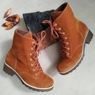 Coturno feminino cano alto