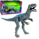Dinossauro Velociraptor 30 Cm Em Vinil Com Som e Acessórios.