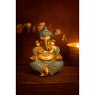 Escultura decorativa do ganesha sentado