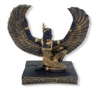 Escultura egipcia isis de asas abertas dourada