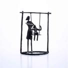Escultura Em Metal Preto Balanço 18x13,5cm