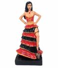 Escultura Pomba gira preta e vermelha 15 cm com crânio no pé 7 saias em resina
