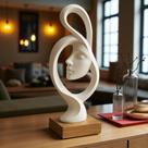 Escultura "Serenidade Infinita" - União entre o rosto feminino e o símbolo do infinito, representando a paz interior que atravessa o tempo