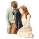 Estátuas memoriais: casal Hensonever com estatuetas de cachorro preto