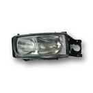 Farol VOLVO VM Lado Direito "Deitado"