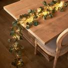 Guirlanda artificial de eucalipto Hairui de 1,8 m com 96 luzes LED