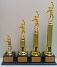 Kit com 4 troféus de vôlei (23 cm, 34 cm, 40 cm, 46 cm).