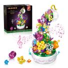 Kit de blocos de construção Caixa de música HOGOKIDS Flowers com luz 571 unidades