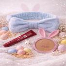 Kit Faixa de Pascoa para Maquiagem com 3 itens: 1 Faixa, 1 Lip Gloss Pink 21 e 1 Pó Compacto Facial