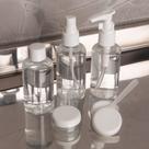 Kit Viagem Porta Shampoo Frascos e Pote Creme 8 Peças com Necessaire Transparente