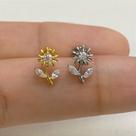 Labret titânio girassol inteiro com zircônias cristal