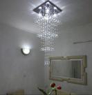 Lustre de cristal para sala modelo torre base de inox 38x38cm com 1,20 metros de altura Lustre de cristal para sala modelo torre base de inox 38x38cm com 1,20 metros de altura