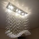 Lustre para mesa de jantar em cristais legítimos com 60cm de altura, base de inox de 70x20cm