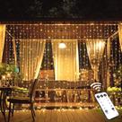 Luzes de cortina de Natal JMEXSUSS 600 LED Outdoor Warm White