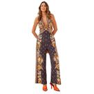 Macacão feminino gola halter decote profundo estampa tropical