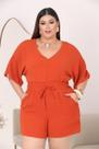 Macaquinho Plus Size com Mangas Morcego e Detalhe Lastex na Cintura