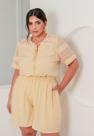Macaquinho Plus Size com Renda Crochê e Decote V