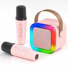 Máquina de karaokê LZYOC Mini Portable com 2 microfones sem fio rosa