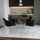 Mesa Jantar Redonda 110cm Amêndoa Clips 3 Pés com 4 Poltronas Pretas Eames Eiffel Ferro Branco