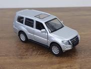 Miniatura Mitsubishi Pajero 4WD Turbo Real 1:43 Metal e Fricção Prata